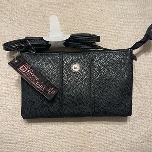 Brand new never touched black leather bag